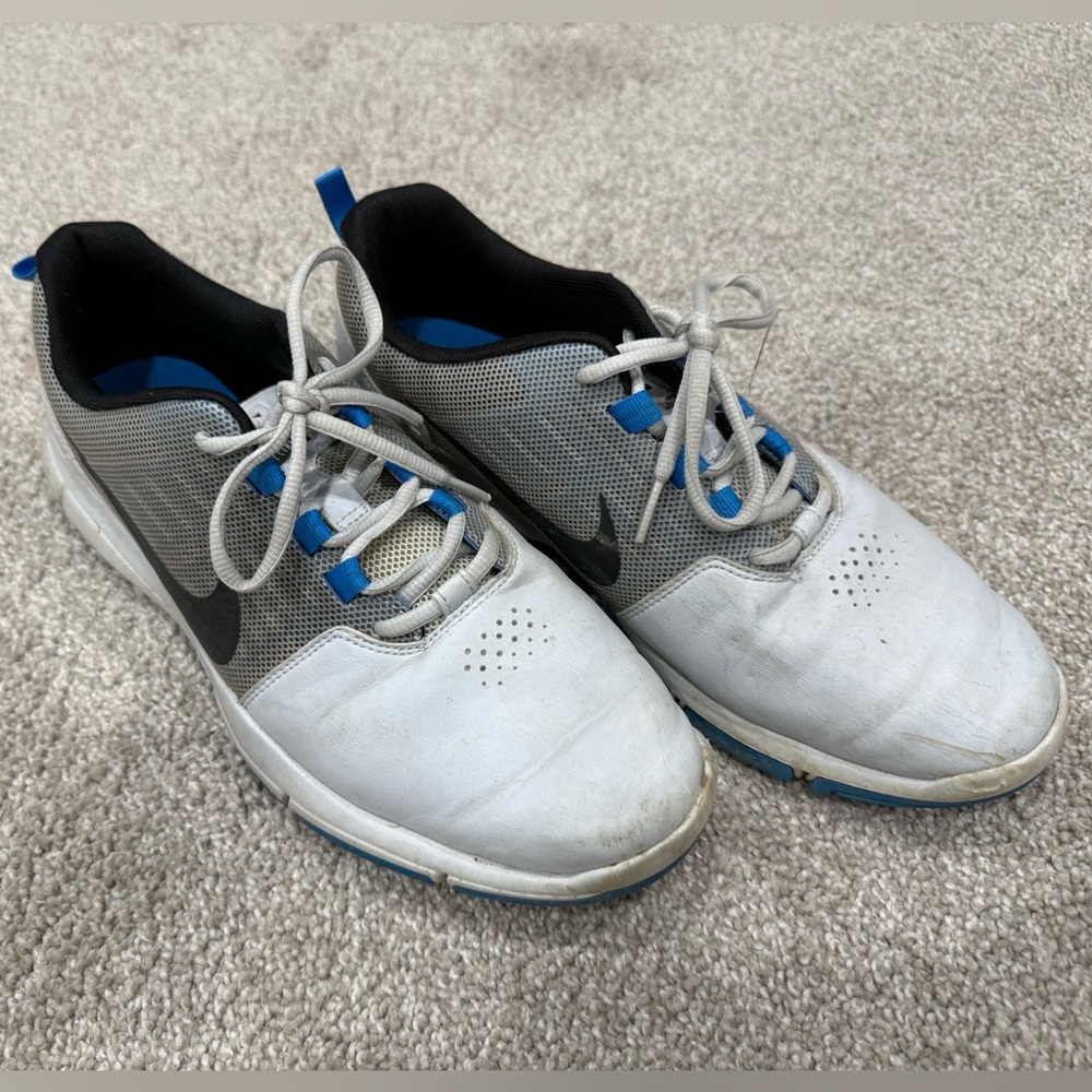Nike Men's White, Black, and Blue Spikeless Golf Shoes